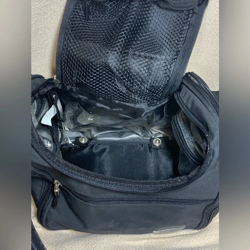 black travel bag for make up or toiletries